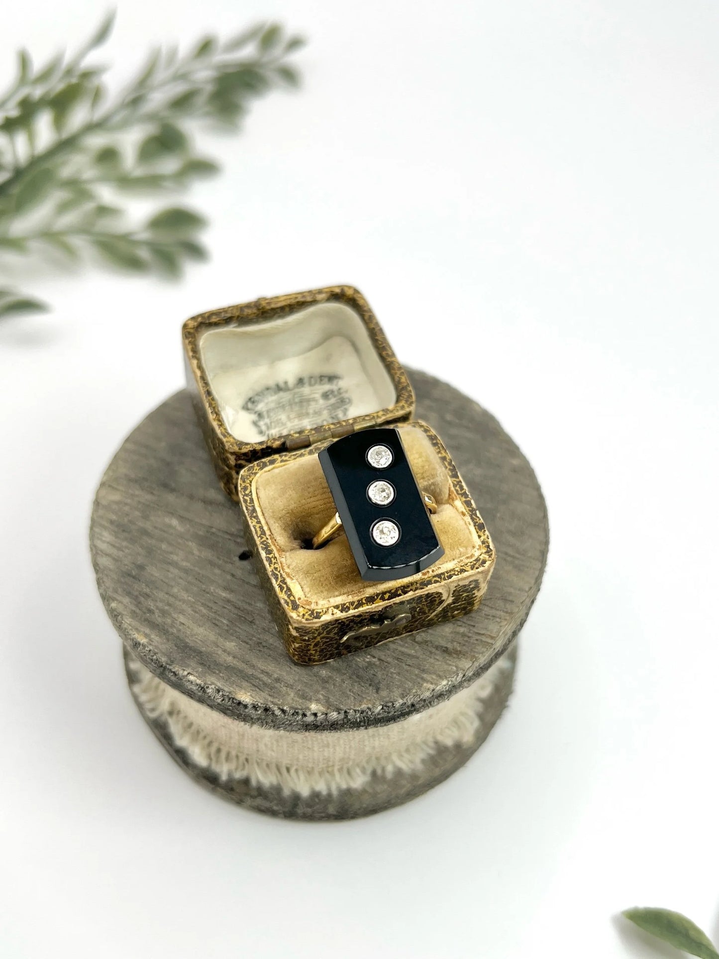 Art Deco 18 Carat Gold Rectangular Onyx and Diamond Three Stone Ring, Circa 1920