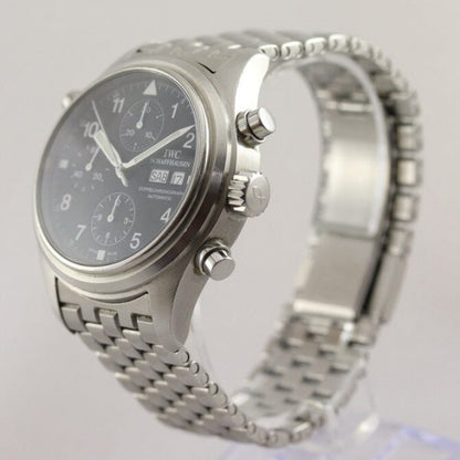 IWC Double Chronograph 42mm Stainless Steel Automatic Watch; black dial with Arabic numerals, weekday and date indicators at 3 hour mark and sapphire crystal. With double chronograph (split seconds/Rattrapante) function, on a stainless steel bracelet with steel fold-over clasp, with IWC box
