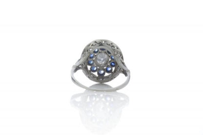 Art Deco Old Cut Diamond, Sapphire and Platinum Oval Cluster Ring, Made in France, Circa 1920