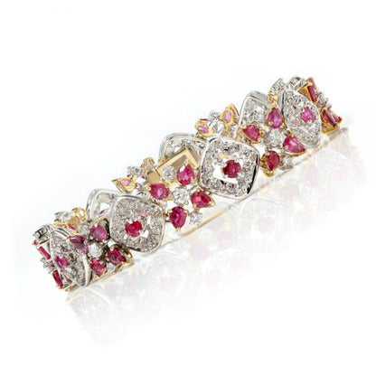 Vintage Thai Ruby and Diamond Bracelet; comprised of 3.52cts mixed-cut Thai rubies and 2.61cts brilliant-cut diamonds in alternating clusters set in 18ct yellow and white gold, Circa 1970s, with GCS certificate