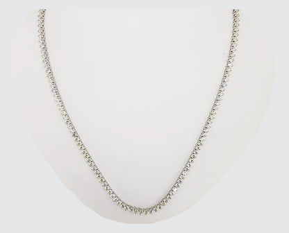 10.01ct Diamond Line Necklace; comprising of round brilliant-cut diamonds, claw-set and mounted in 18ct white gold. Total diamond weight 10.01 carats.