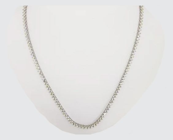 10.01ct Diamond Line Necklace; comprising of round brilliant-cut diamonds, claw-set and mounted in 18ct white gold. Total diamond weight 10.01 carats.