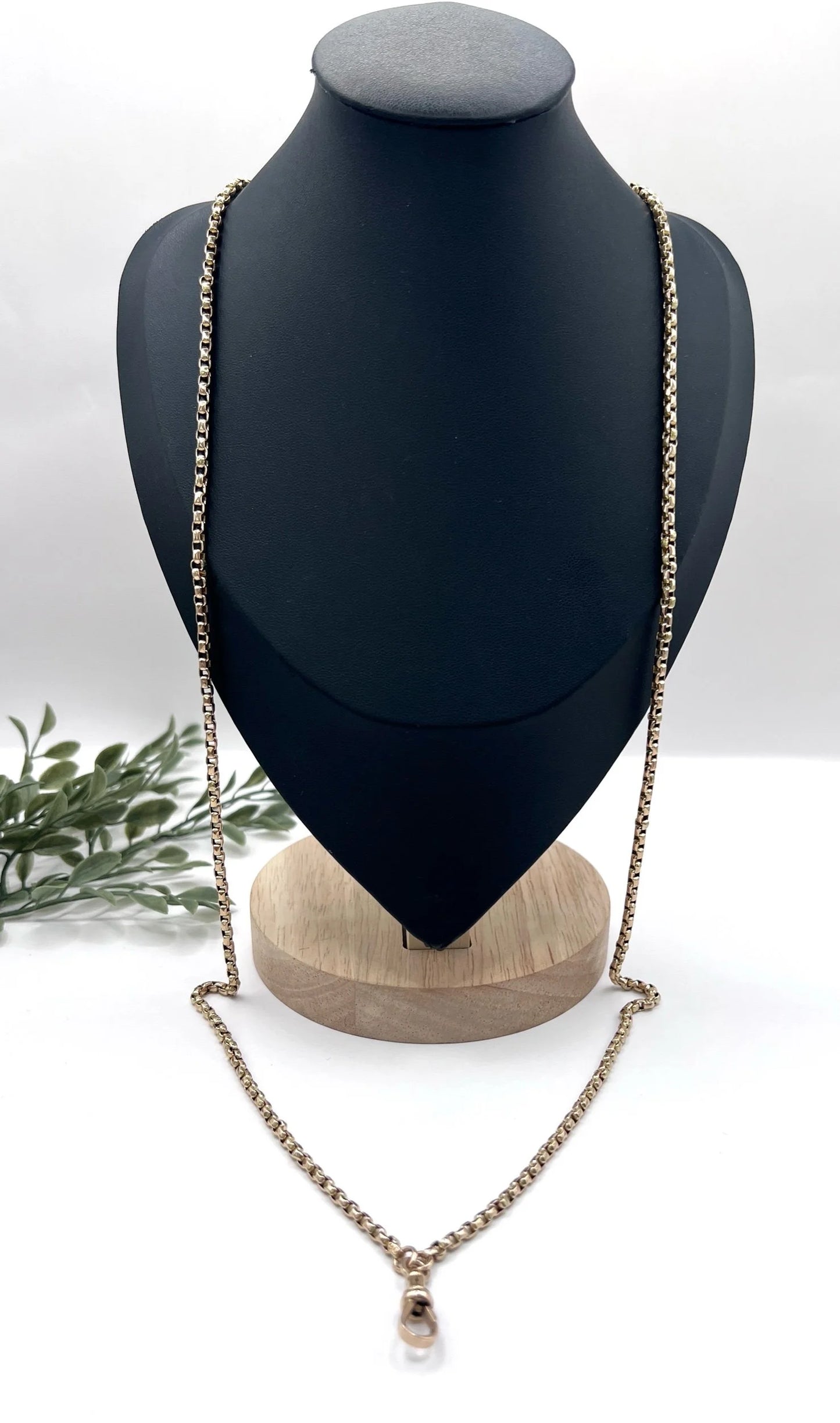 A long rose gold link necklace with swivel clasp