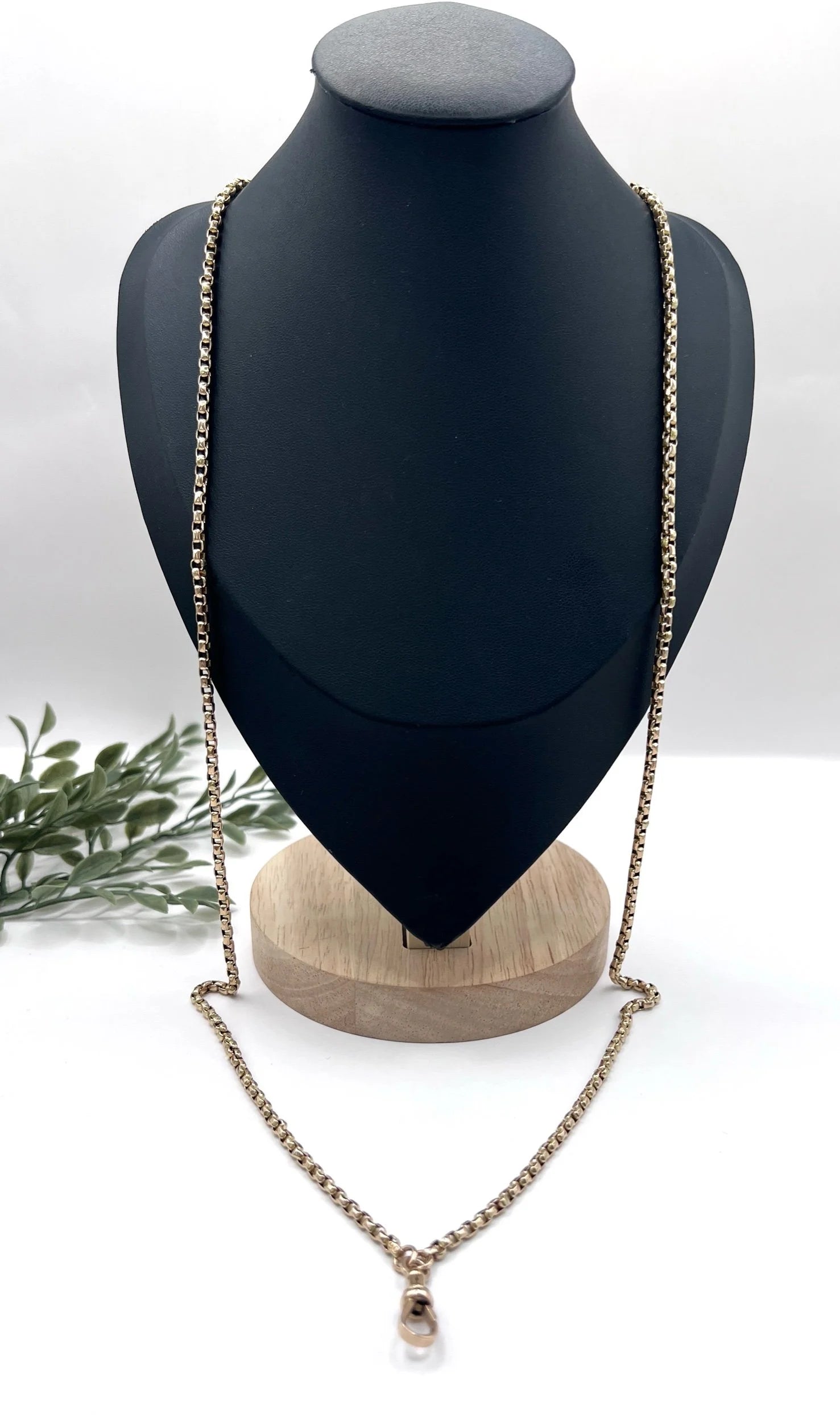 A long rose gold link necklace with swivel clasp
