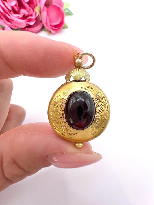 Victorian 15 Carat Two-Colour Gold Cabochon Garnet Locket Back Pendant, Circa 1870