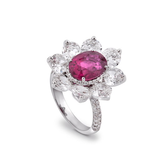 Burmese Ruby and Old Cut Diamond Floral Cluster Ring; central 3.69 carat Burmese ruby framed by 8 round old-cut diamonds, accented by 94 pave set diamonds. Total diamond weight 4.46cts