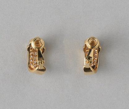 Contemporary 1.36ct Diamond set 18ct Yellow Gold Buckle Clip Earrings, 1.36 carat total, Master mark: DM for David Morris, England, 1990