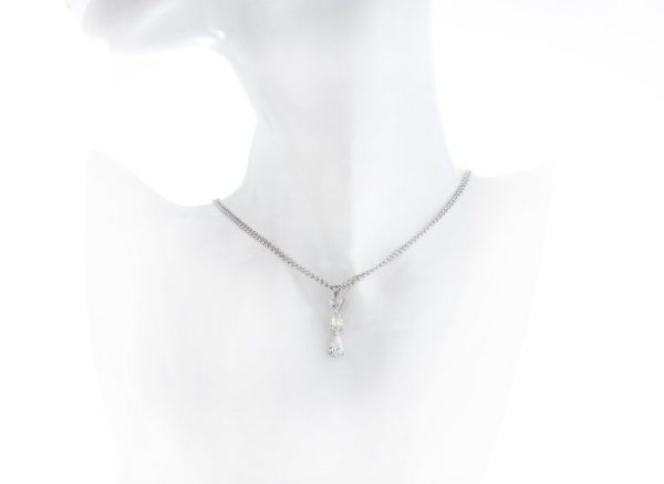 Filk Italian Diamond Drop Necklace, 1.55cts, oval fancy yellow diamond, triangular and pear-cut diamond, VVS clarity, F colour, Circa 1990's