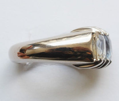 Blue and Yellow Cushion Cut Sapphire and 18ct Grey Gold Heavy Dress Ring; set with a 2.80ct light blue sapphire and 2.73ct yellow sapphire