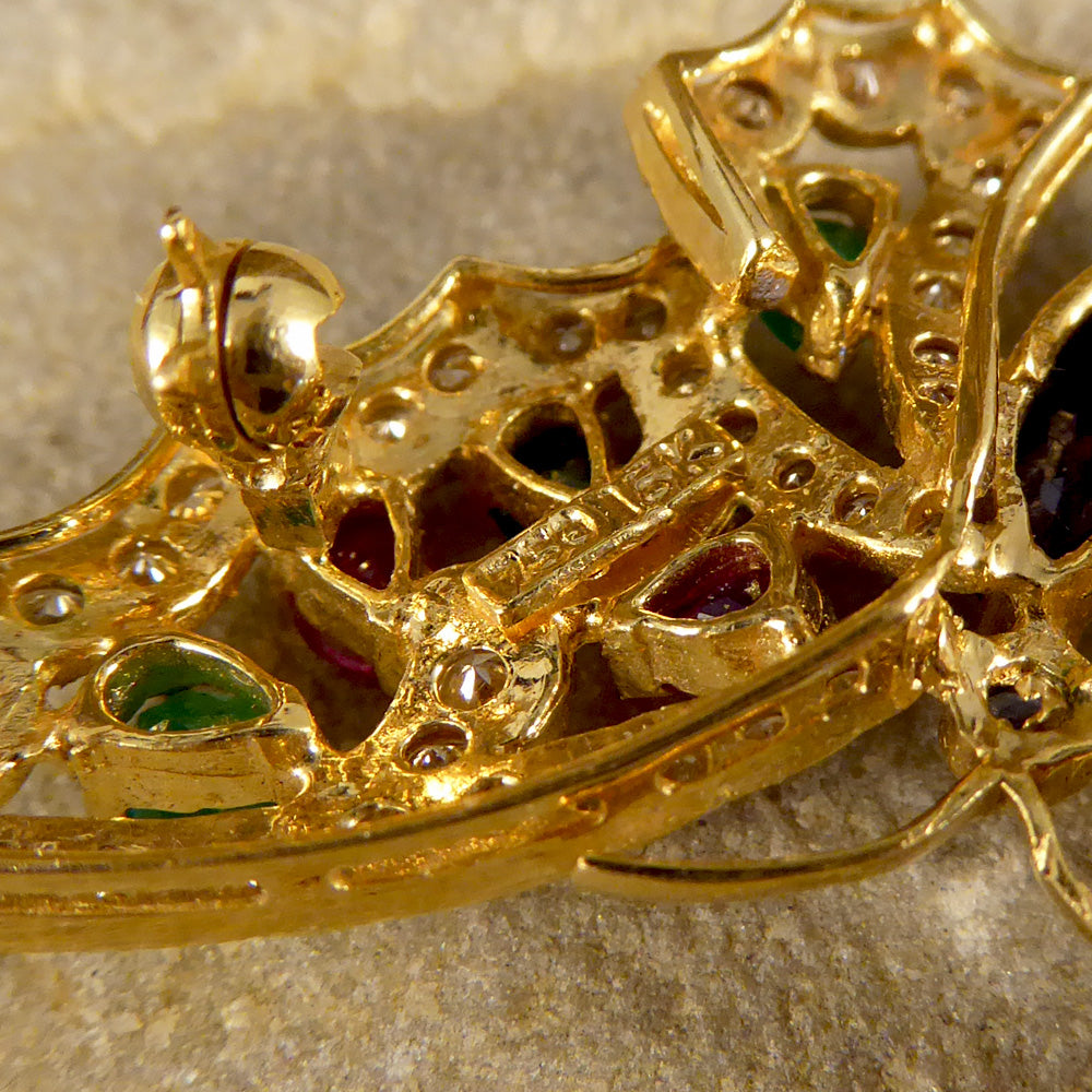 Contemporary diamond emerald ruby and sapphire butterfly brooch in 18ct gold