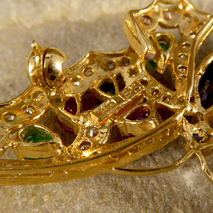 Contemporary diamond emerald ruby and sapphire butterfly brooch in 18ct gold