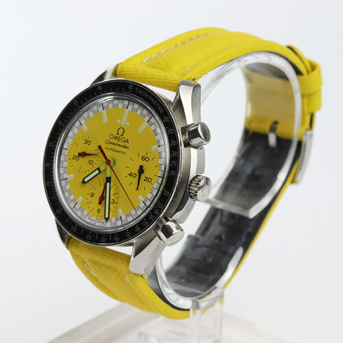 Omega Speedmaster Schumacher Style 39mm Automatic Chronograph, yellow dial, acrylic crystal, on yellow leather strap with Omega steel pin buckle.