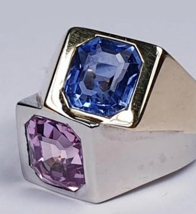 Avant Garde Pink and Blue Sapphire Two Tone Ring; striking vintage retro asymmetrical design with a natural unheated pink sapphire set in platinum and a 3ct natural unheated cornflour blue sapphire set in 18ct yellow gold. Attributed to Rene Boivin, French 1940