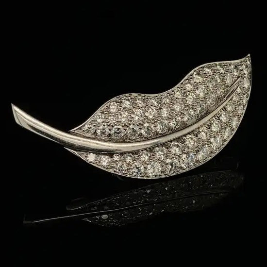Vintage Van Cleef and Arpels 3ct Diamond Leaf Brooch, set with 3.10 carats of brilliant-cut diamonds in 18ct white gold Signed and Numbered Circa 1950s