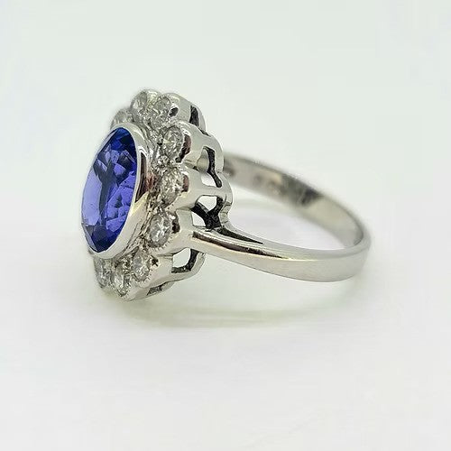 3ct Oval Tanzanite and Diamond Floral Cluster Engagement Ring