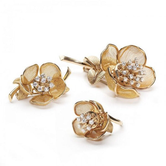 Vintage Piaget 18ct Gold and Diamond Flower Suite, comprising a ring and two brooches, articulated gold mesh set with diamonds, Circa 1960