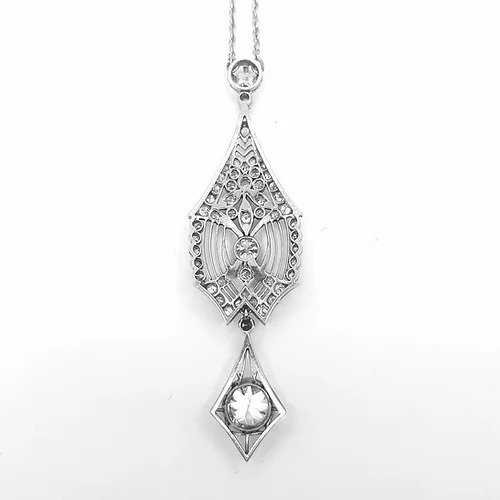 Belle Epoque 1.50ct Diamond and Platinum Pendant; combining floral and geometric forms. Central diamond estimated 1.50 carats