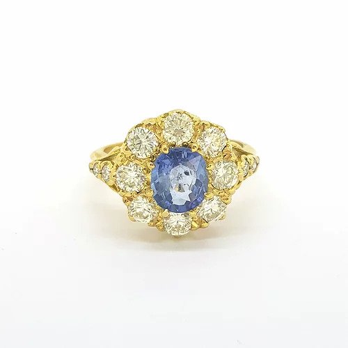 Sapphire and Old Cut Diamond Cluster Ring; central 1.30ct sapphire is claw-set slightly higher than 1.40cts old-cut diamond surround, in 18ct yellow gold