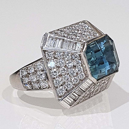 Vintage 4ct Aquamarine and Diamond Bombe Cluster Ring, 4ct good colour emerald-cut aquamarine set atop a handmade geometric platinum mount, Circa 1980s