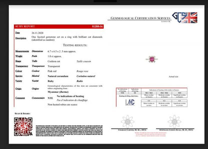 Vintage 1ct Burmese Ruby and Diamond Floral Cluster Ring; set with a natural 1.00 carat octagonal-cut Burmese ruby surrounded by 0.48cts round brilliant-cut diamonds. Circa 1950s-1970s, with Certificate