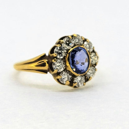 Antique Style 0.80ct Oval Sapphire and Diamond Cluster Engagement Ring in 18ct Yellow Gold