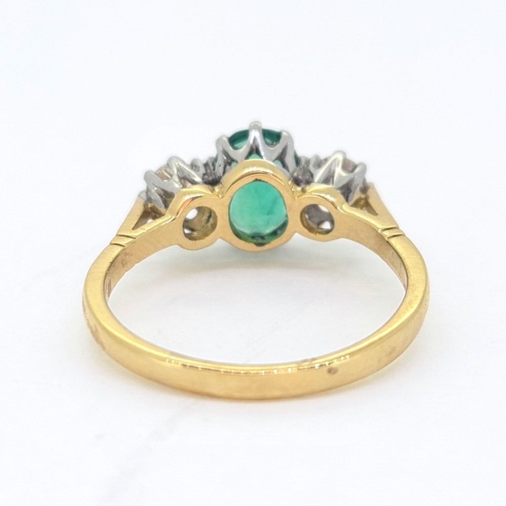1.10ct Oval Emerald and Diamond Three Stone Engagement Ring