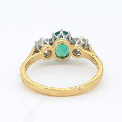 1.10ct Oval Emerald and Diamond Three Stone Engagement Ring