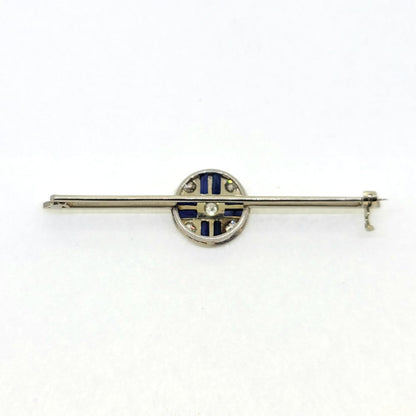 Sapphire and Diamond Bar Brooch in Platinum, elegant platinum bar brooch set with a central circular sapphire and diamond cluster