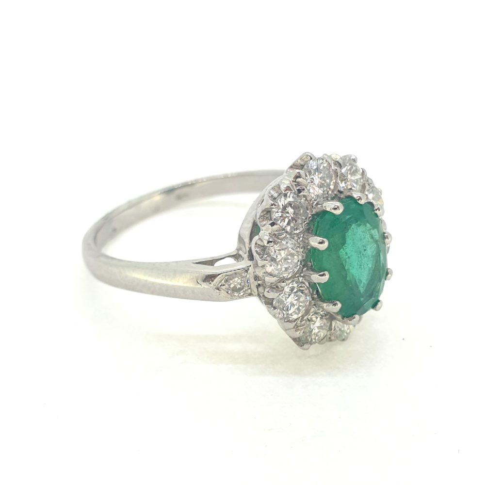 1.31ct Oval Emerald and Diamond Cluster Engagement Ring in Platinum