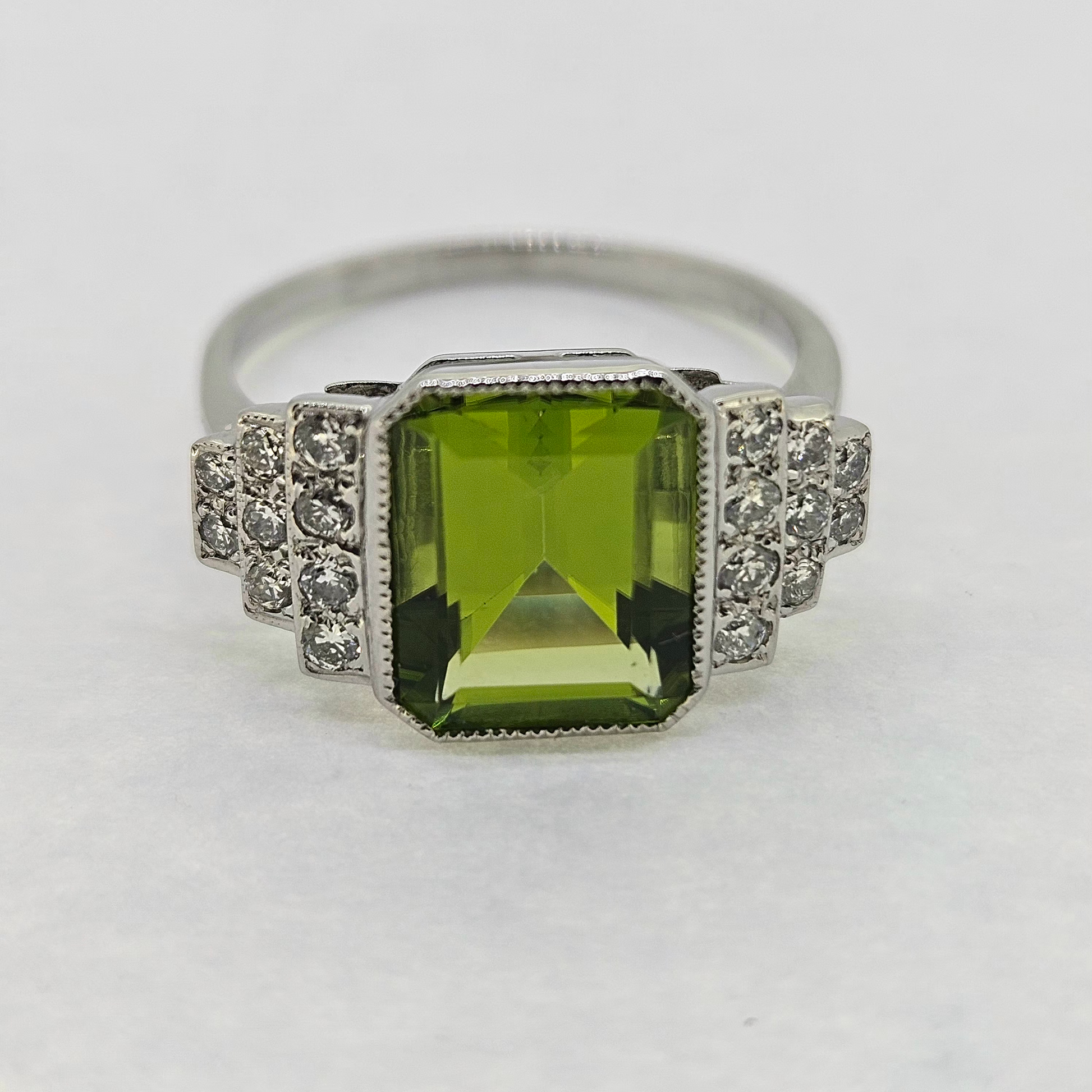 2.4ct Emerald Cut Peridot and Diamond Cluster Ring in Platinum