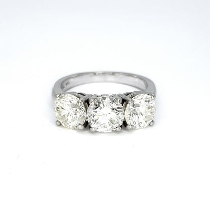 Diamond Three Stone Ring in 18ct White Gold, 3.73 carat total, central 1.30 carat round brilliant-cut diamond flanked by diamonds totalling an additional 2.43 carats