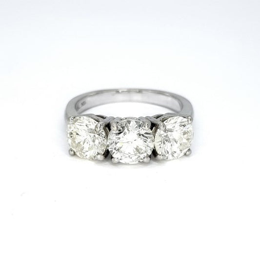 Diamond Three Stone Ring in 18ct White Gold, 3.73 carat total, central 1.30 carat round brilliant-cut diamond flanked by diamonds totalling an additional 2.43 carats