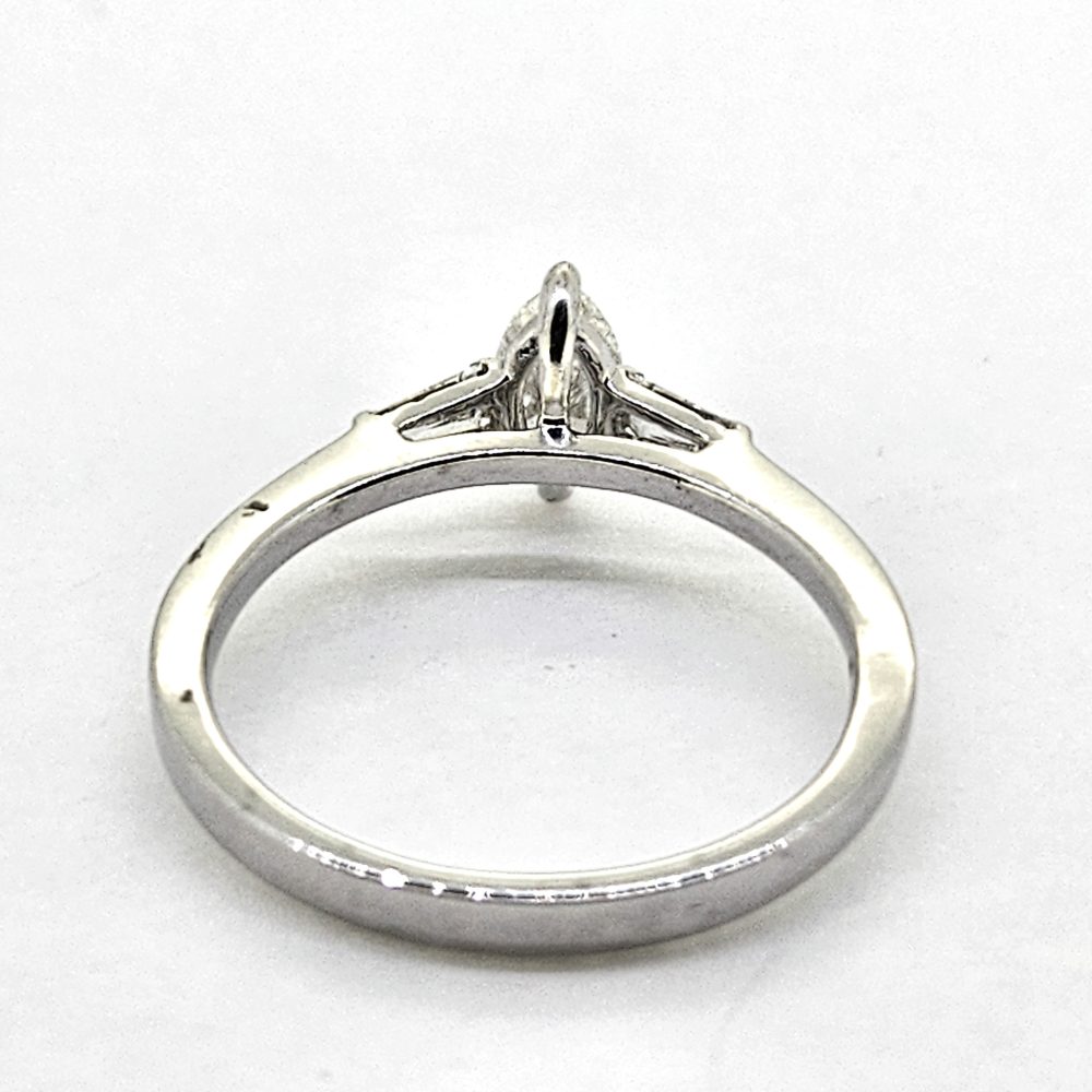 Marquise Cut Diamond Solitaire Engagement Ring with Baguette Shoulders
