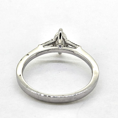 Marquise Cut Diamond Solitaire Engagement Ring with Baguette Shoulders