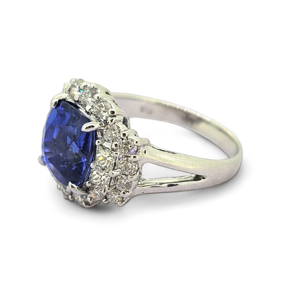Oval Cushion Shaped Sapphire and Diamond Cluster Engagement Ring in 18ct white gold with split shoulders