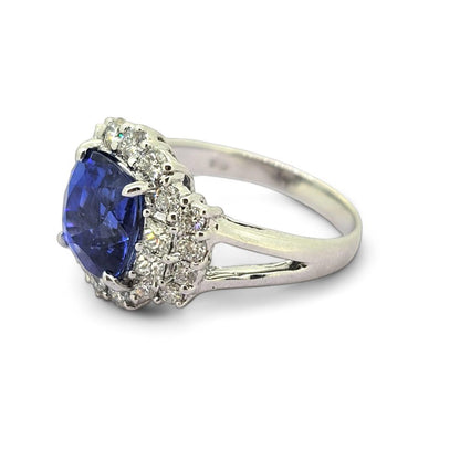 Oval Cushion Shaped Sapphire and Diamond Cluster Engagement Ring in 18ct white gold with split shoulders