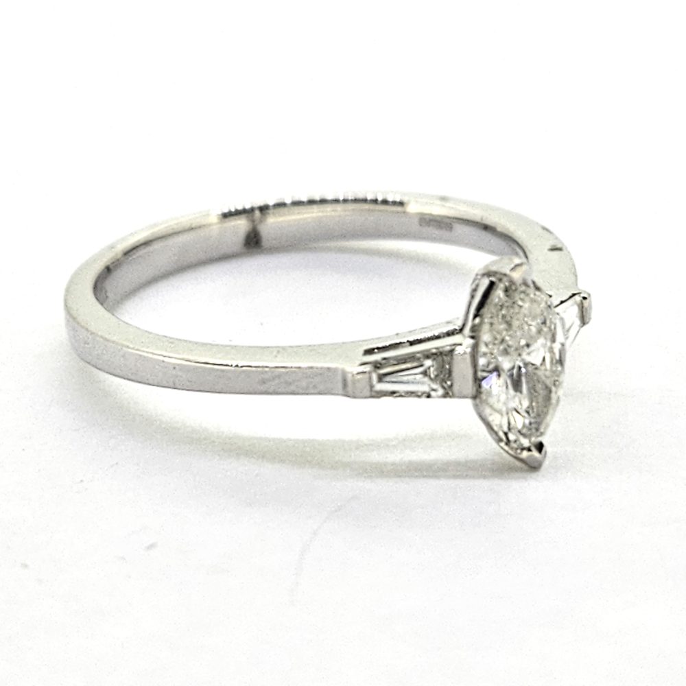 Marquise Cut Diamond Solitaire Engagement Ring with Baguette Shoulders