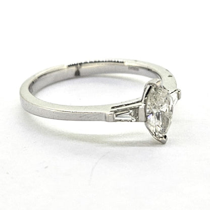 Marquise Cut Diamond Solitaire Engagement Ring with Baguette Shoulders