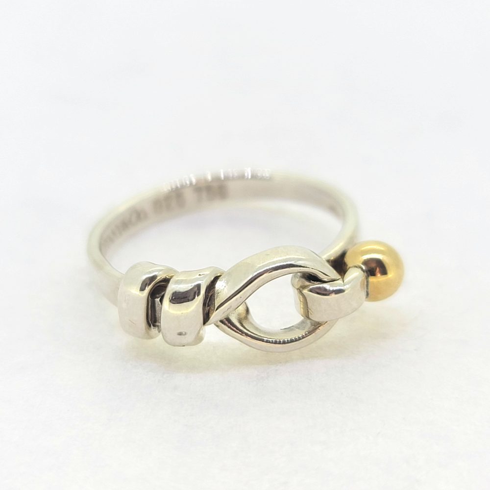 Vintage Tiffany and Co Silver and Gold Knot Hook Ring, 925 silver band with silver knot and hook with 18ct yellow gold ball