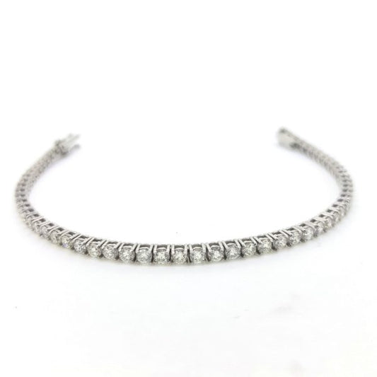 Diamond Line Bracelet; 5.00 carat total, fifty-eight round brilliant-cut diamonds, claw set, and mounted in 18ct white gold, G/H colour, SI clarity