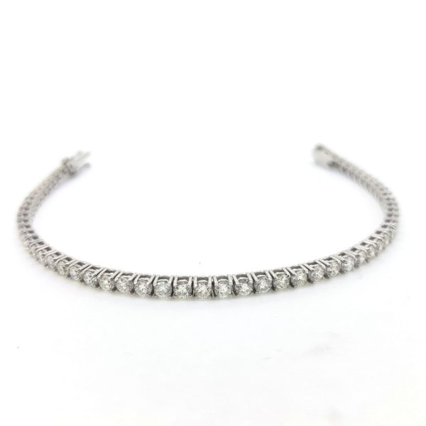 Diamond Line Bracelet; 5.00 carat total, fifty-eight round brilliant-cut diamonds, claw set, and mounted in 18ct white gold, G/H colour, SI clarity
