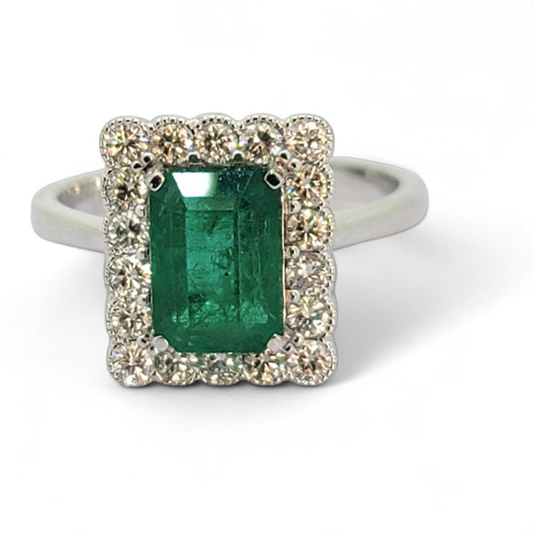 2ct Emerald and Diamond Cluster Engagement Ring, 2.12ct emerald-cut emerald surrounded by rectangular border of sparkling diamonds in 18ct white gold