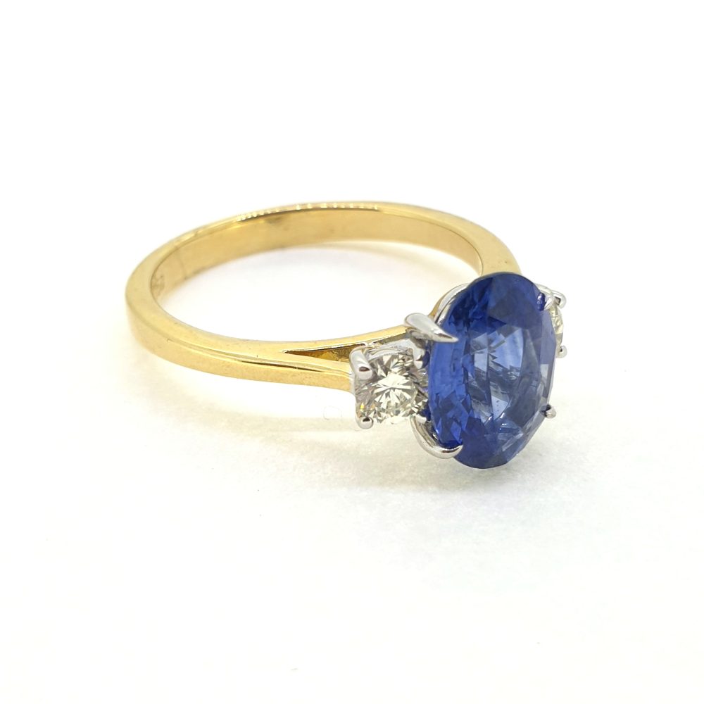2.84ct Oval Sapphire and Diamond Three Stone Engagement Ring