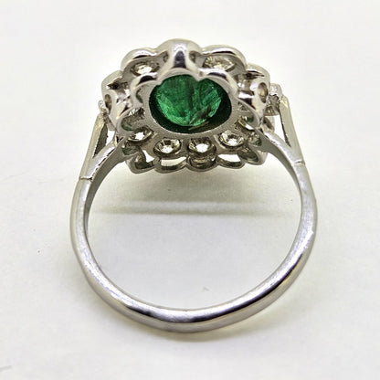 1.50ct Oval Emerald and Diamond Floral Cluster Ring in Platinum