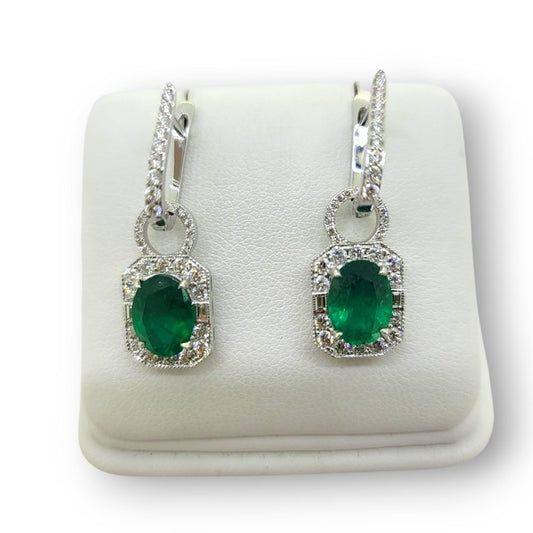 Contemporary 3.16ct Oval Emerald and Diamond Cluster Drop Earrings in 18ct White Gold, oval and diamond clusters suspended from horseshoe shaped diamond tops that can be worn with or without the drop