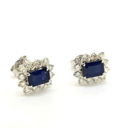 Sapphire and Diamond Cluster Earrings; featuring 1.51cts emerald-cut sapphires surrounded by 0.70cts diamonds, in 18ct white gold
