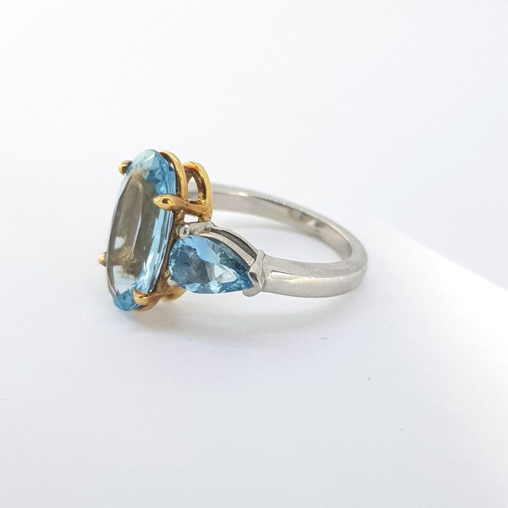 Oval Cut Aquamarine Ring with Pear Cut Shoulders