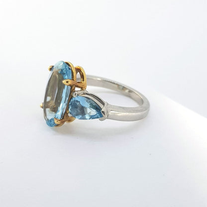 Oval Cut Aquamarine Ring with Pear Cut Shoulders
