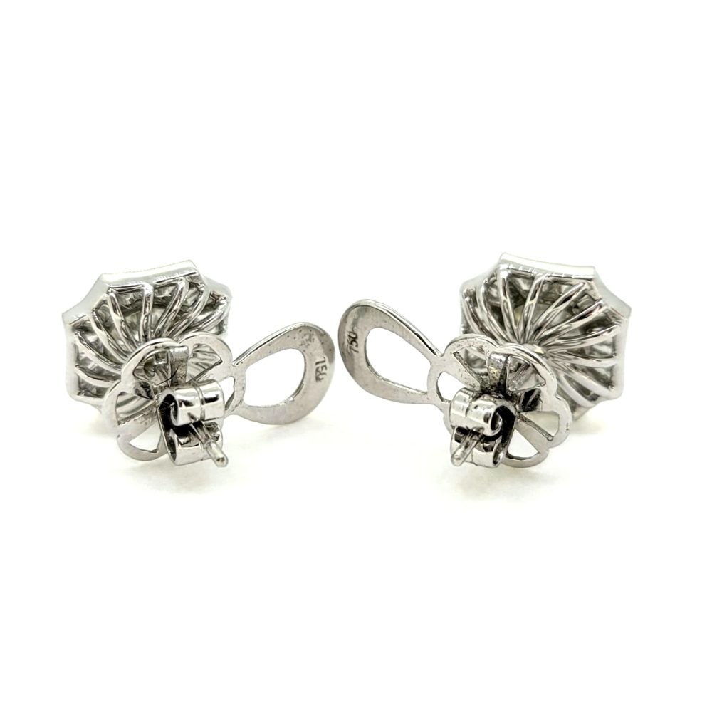 Brilliant and Baguette Cut Diamond Cluster Stud Earrings, 3.82 carat total, central 2.13cts round brilliant-cut diamonds encompassed within 1.69cts tapered baguette-cut diamond surround in 18ct white gold