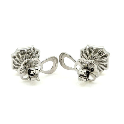 Brilliant and Baguette Cut Diamond Cluster Stud Earrings, 3.82 carat total, central 2.13cts round brilliant-cut diamonds encompassed within 1.69cts tapered baguette-cut diamond surround in 18ct white gold